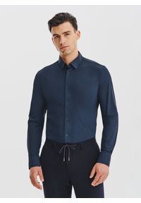 Pako Lorente - PAKO LORENTE – Granatowa dzianinowa koszula męska. Typ kołnierza: kołnierzyk klasyczny. Kolor: niebieski. Materiał: dzianina. Długość rękawa: długi rękaw. Długość: długie. Wzór: gładki. Styl: klasyczny #1