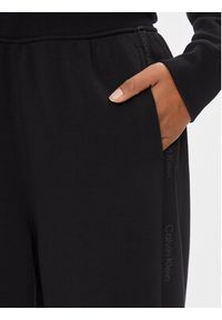 Calvin Klein Performance Spodnie dresowe 00GWS4P656 Czarny Relaxed Fit. Kolor: czarny. Materiał: syntetyk #5