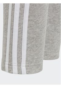 Adidas - adidas Spodnie dresowe Essentials 3-Stripes IC6127 Szary Slim Fit. Kolor: szary. Materiał: bawełna #4