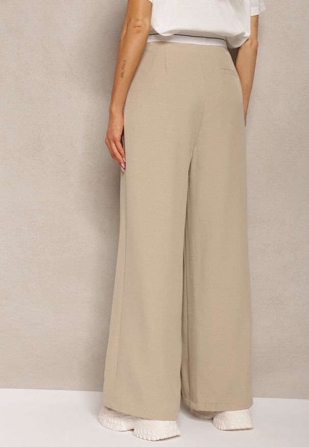 Renee - Beżowe Spodnie z Wiskozy Palazzo High Waist Zapinane na Suwak Nellieva. Okazja: na co dzień. Stan: podwyższony. Kolor: beżowy. Materiał: wiskoza. Styl: casual