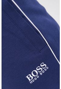 BOSS - Boss Spodnie męskie kolor granatowy gładkie. Kolor: niebieski. Materiał: dzianina. Wzór: gładki #3