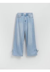Reserved - Jeansy wide leg z kokardkami - niebieski. Kolor: niebieski