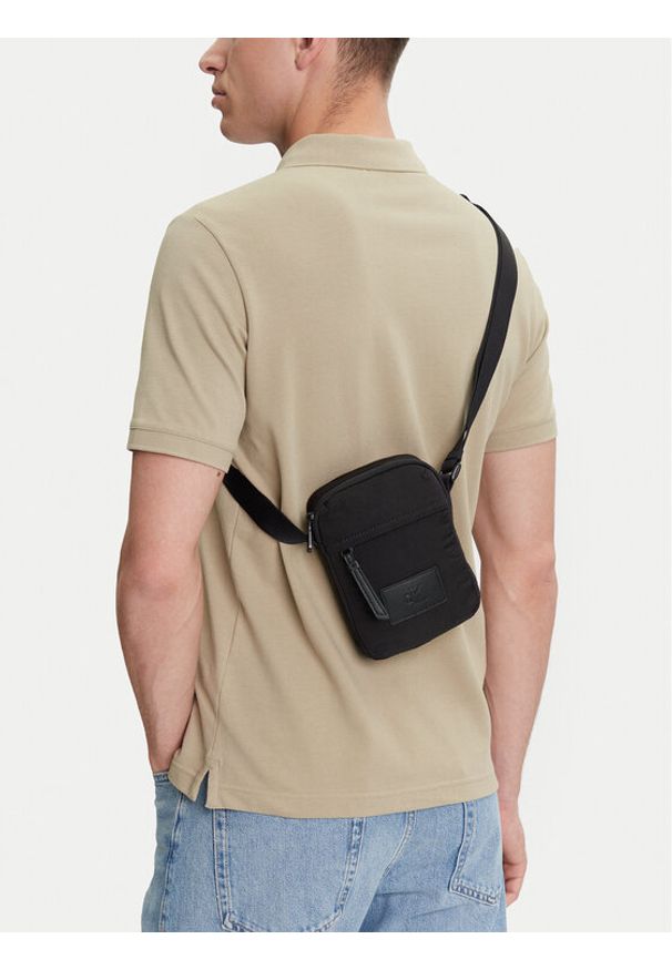 Calvin Klein Jeans Saszetka Metro Nylon Reporter Bag LV04G3089G Czarny. Kolor: czarny. Materiał: materiał