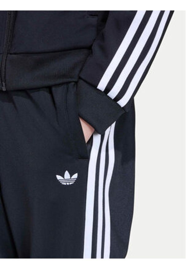 Adidas - adidas Spodnie dresowe adicolor SST KE2862 Czarny Regular Fit. Kolor: czarny. Materiał: syntetyk