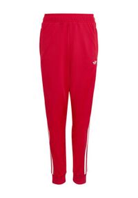 Adidas - adidas Spodnie dresowe adicolor SST KE2861 Czerwony Regular Fit. Kolor: czerwony. Materiał: syntetyk #3