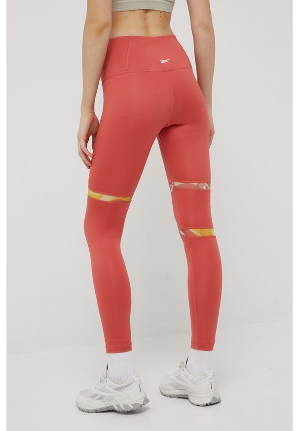 Reebok legginsy treningowe MYT Detail damskie kolor pomarańczowy z aplikacją. Kolor: pomarańczowy. Materiał: skóra, poliester, dzianina, materiał. Wzór: aplikacja