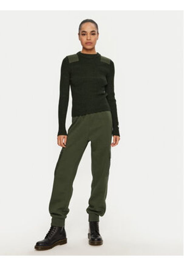 Champion Spodnie dresowe 117499 Khaki Regular Fit. Kolor: brązowy. Materiał: syntetyk