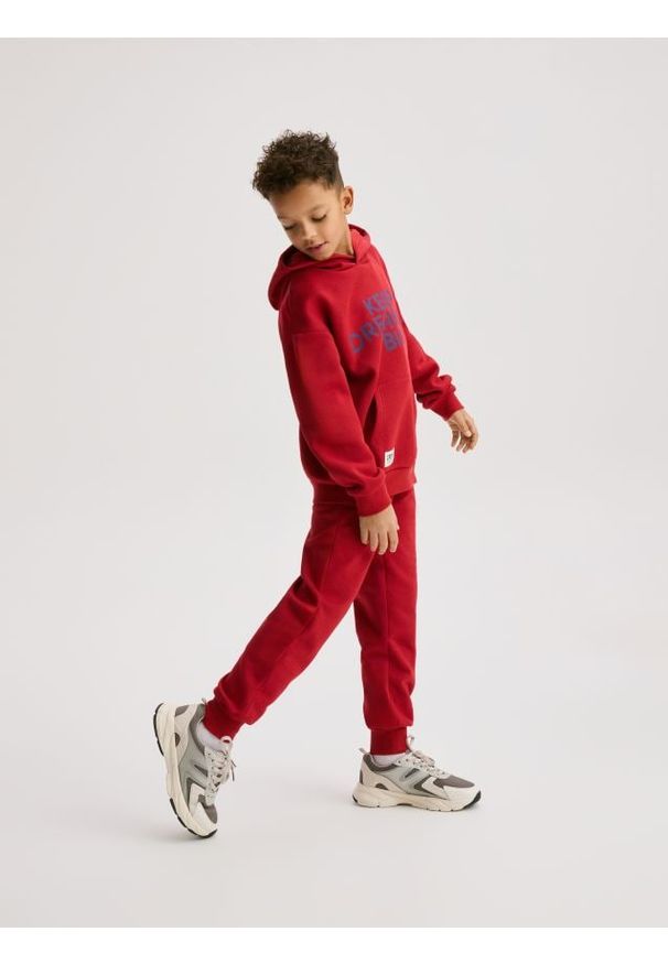 Reserved - Bawełniane spodnie jogger - czerwony. Kolor: czerwony. Materiał: bawełna