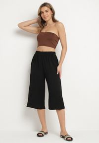 Born2be - Czarne Spodnie o Długości 3/4 z Szerokimi Nogawkami Ulianisa. Okazja: na co dzień, na spacer. Kolor: czarny. Wzór: aplikacja. Styl: casual #5