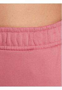outhorn - Outhorn Spodnie dresowe TTROF041 Różowy Relaxed Fit. Kolor: różowy. Materiał: bawełna #4