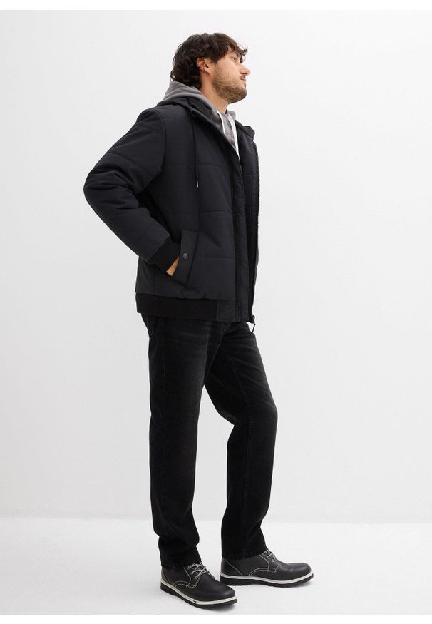bonprix - Zimowa kurtka pikowana o kroju bomberki z kapturem. Typ kołnierza: kaptur. Kolor: czarny. Sezon: zima