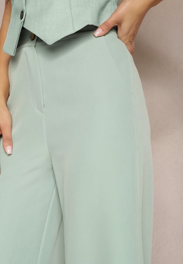 Renee - Jasnozielone Spodnie Szerokie Laodaleia. Stan: podwyższony. Kolor: zielony. Materiał: tkanina. Długość: długie. Wzór: gładki. Styl: elegancki