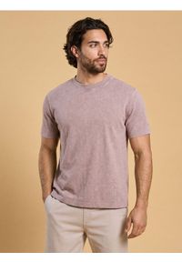 Sinsay - Bluza z krótkim rękawem z dzianiny terry z efektem mineral wash - beżowy. Kolor: beżowy. Materiał: dzianina. Długość rękawa: krótki rękaw. Długość: krótkie
