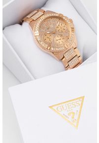 Guess zegarek damski kolor różowy. Kolor: różowy. Materiał: materiał #2