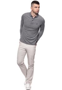 Wrangler - WRANGLER POLO LS POLO REAL BLACK W7A87K5W5 112131306. Typ kołnierza: polo. Długość rękawa: długi rękaw. Długość: długie. Wzór: melanż #7