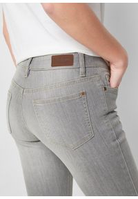 bonprix - Wygodne dżinsy ze stretchem o kroju bootcut, mid waist. Kolor: szary