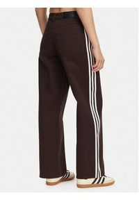 Adidas - adidas Jeansy Firebird KD2934 Brązowy Loose Fit. Kolor: brązowy #5