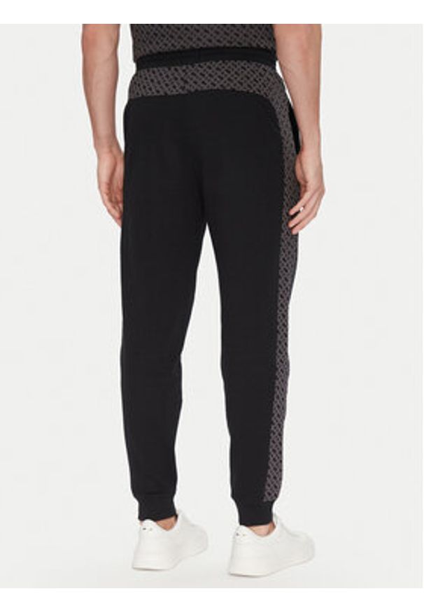 BOSS Spodnie dresowe Luke 50546839 Czarny Regular Fit. Kolor: czarny. Materiał: bawełna