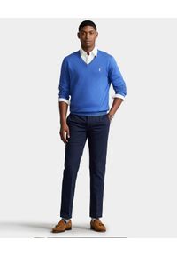 Ralph Lauren - RALPH LAUREN - Niebieski sweter z haftowanym logo. Typ kołnierza: polo. Kolor: niebieski. Materiał: bawełna. Długość rękawa: długi rękaw. Długość: długie. Wzór: haft #4