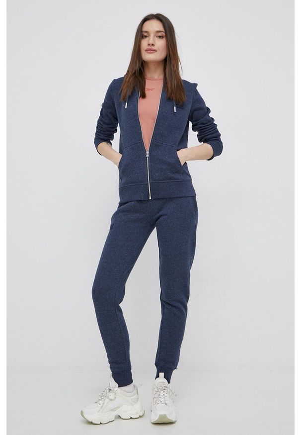 Superdry bluza damska kolor granatowy z kapturem gładka. Okazja: na co dzień. Typ kołnierza: kaptur. Kolor: niebieski. Materiał: dzianina. Wzór: gładki. Styl: casual