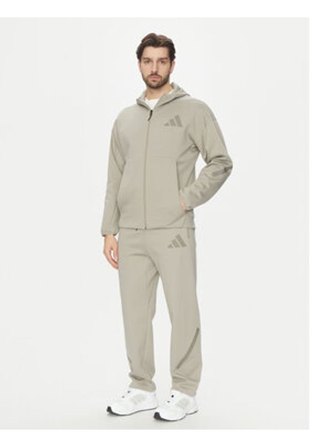 Adidas - adidas Spodnie dresowe Z.N.E. Open-Hem JC6716 Beżowy Loose Fit. Kolor: beżowy. Materiał: syntetyk