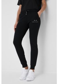 Armani Exchange spodnie dresowe damskie kolor czarny gładkie. Kolor: czarny. Materiał: dresówka. Wzór: gładki
