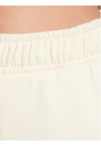 outhorn - Outhorn Spodnie dresowe TTROF041 Beżowy Regular Fit. Kolor: beżowy. Materiał: bawełna, dresówka #5