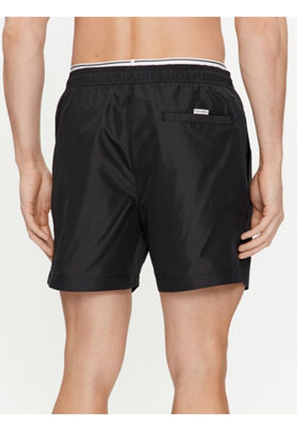 Calvin Klein Swimwear Szorty kąpielowe KM0KM00957 Czarny Regular Fit. Kolor: czarny. Materiał: syntetyk