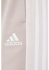 Adidas - adidas dres damski kolor beżowy. Kolor: beżowy. Materiał: dresówka #7