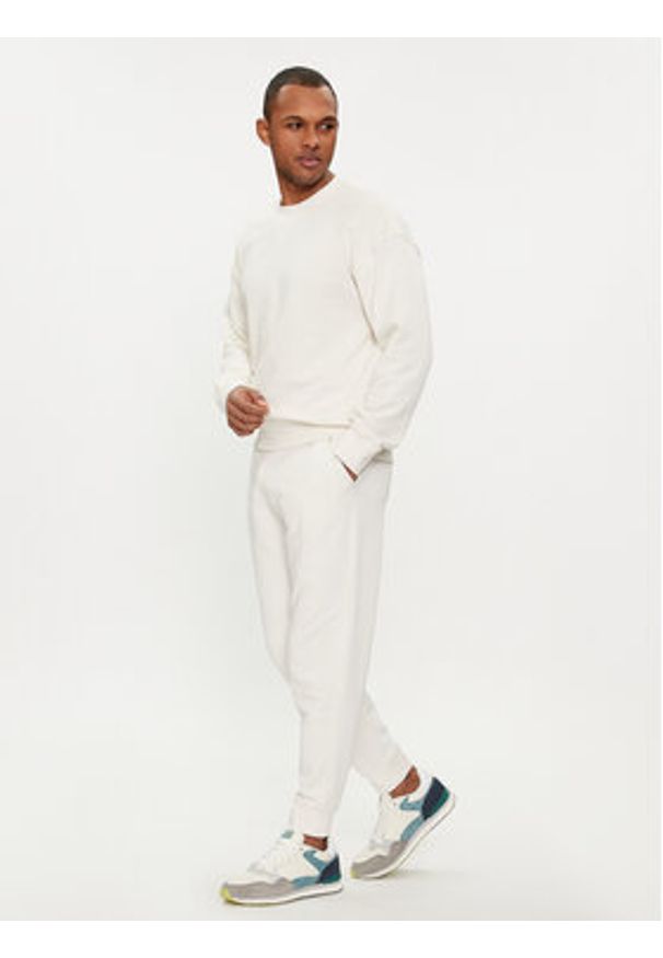 United Colors of Benetton - United Colors Of Benetton Spodnie dresowe 3J68UF00K Écru Regular Fit. Materiał: bawełna
