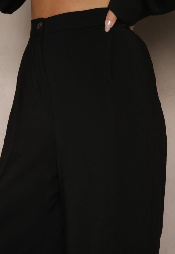 Renee - Czarne Spodnie Low Waist z Modalu z Szeroką Nogawką Reanelira. Okazja: na co dzień. Stan: obniżony. Kolor: czarny. Styl: klasyczny, casual, elegancki