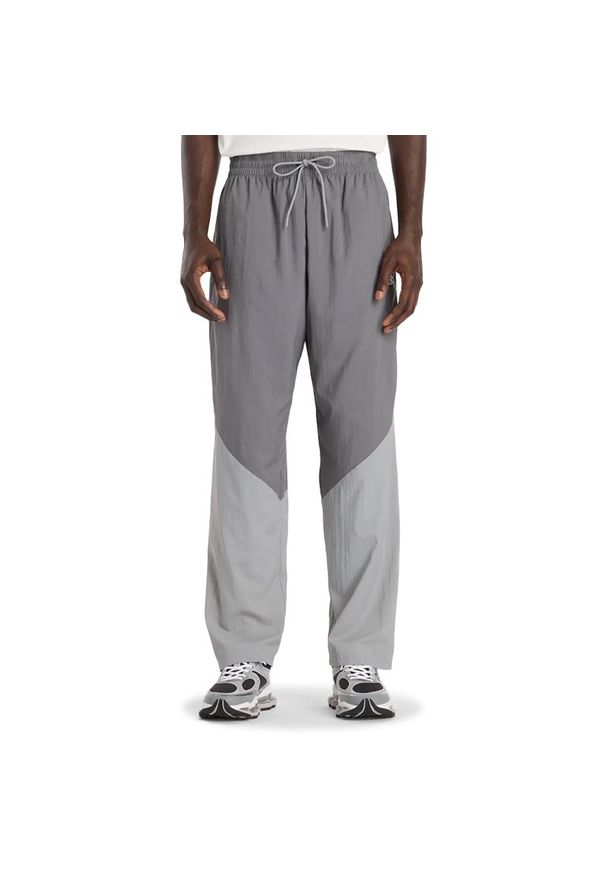 Spodnie męskie New Balance MB61R010CAS - szare. Kolor: szary. Materiał: materiał, poliester