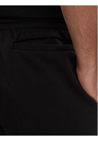 Adidas - adidas Spodnie dresowe Essentials Fleece Regular Tapered Joggers HL2236 Czarny Regular Fit. Kolor: czarny. Materiał: bawełna