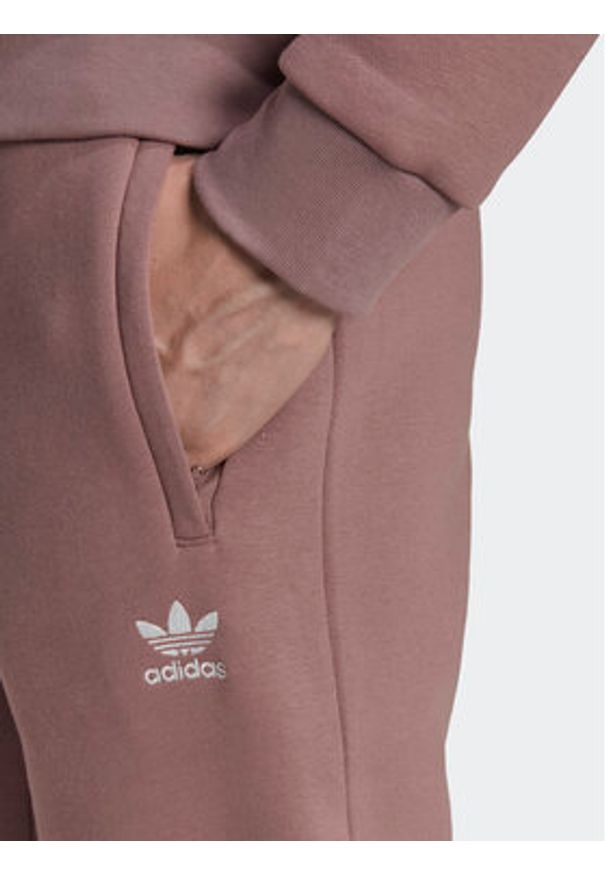Adidas - adidas Spodnie dresowe adicolor Essentials Trefoil HK0105 Różowy Slim Fit. Kolor: różowy. Materiał: dresówka, bawełna