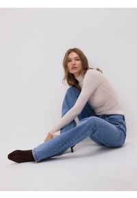 Reserved - Jeansy flare bootcut - niebieski. Kolor: niebieski