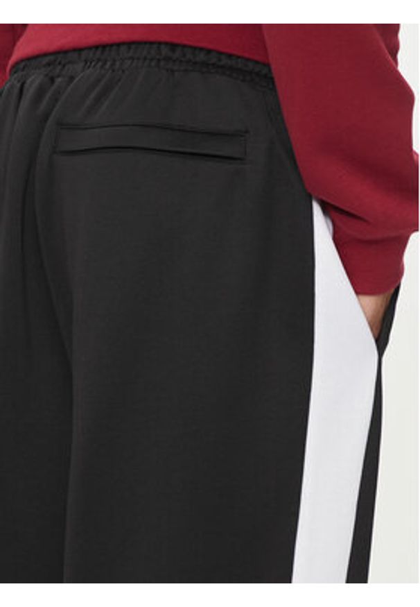 Puma Spodnie dresowe Iconic T7 625412 Czarny Straight Leg. Kolor: czarny. Materiał: bawełna, syntetyk