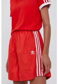 adidas Originals Szorty H37751 damskie kolor czerwony gładkie high waist. Okazja: na co dzień. Stan: podwyższony. Kolor: czerwony. Materiał: tkanina, materiał. Wzór: gładki. Styl: casual #3