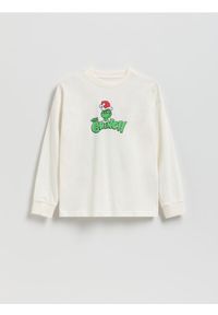 Reserved - Longsleeve Grinch - złamana biel. Materiał: dzianina, bawełna. Długość rękawa: długi rękaw