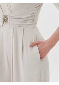 Rinascimento Kombinezon CFC0123772003 Beżowy Regular Fit. Kolor: beżowy. Materiał: syntetyk