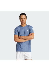 Adidas - Koszulka Own the Run. Kolor: niebieski. Materiał: materiał. Sport: bieganie #1