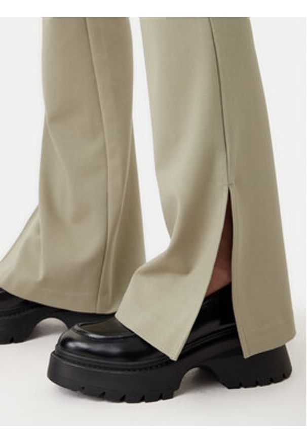 Calvin Klein Jeans Legginsy Milano J20J225089 Zielony Slim Fit. Kolor: zielony. Materiał: syntetyk