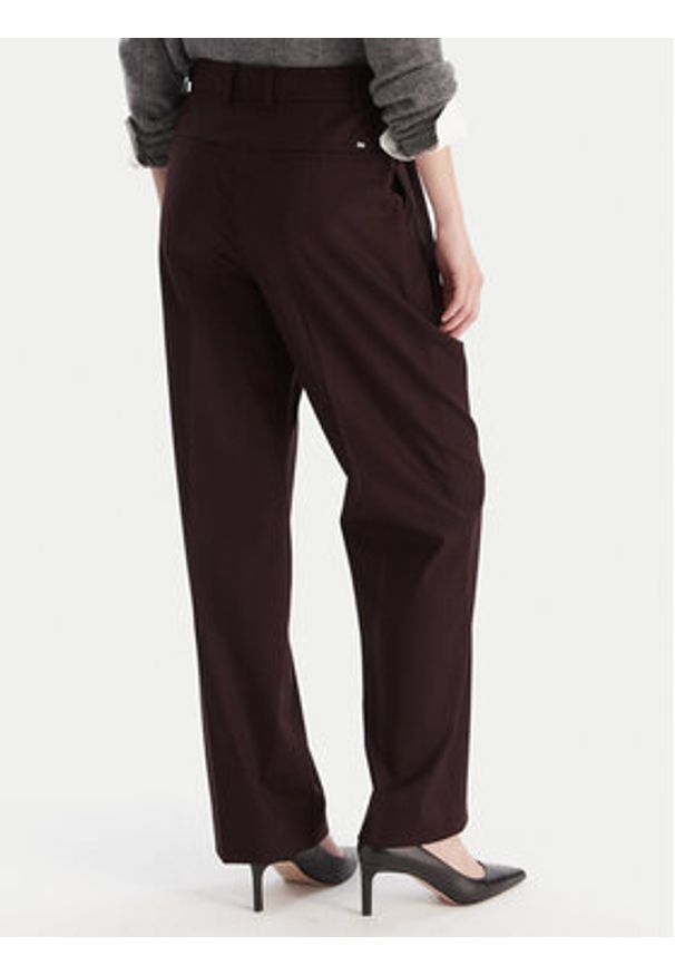 TOMMY HILFIGER - Tommy Hilfiger Spodnie materiałowe WW0WW48358 Bordowy Relaxed Fit. Kolor: czerwony. Materiał: wiskoza, syntetyk