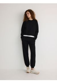 Reserved - Dresowe spodnie jogger z bawełną - czarny. Kolor: czarny. Materiał: bawełna, dresówka #1