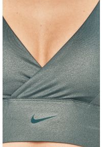 Nike - Biustonosz sportowy. Kolor: zielony. Rodzaj stanika: wyciągane miseczki, odpinane ramiączka #3