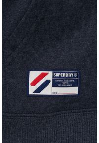 Superdry bluza męska kolor granatowy z kapturem gładka. Okazja: na co dzień. Typ kołnierza: kaptur. Kolor: niebieski. Materiał: dzianina. Wzór: gładki. Styl: casual #5