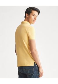 Ralph Lauren - RALPH LAUREN - Koszulka polo Slim Fit. Typ kołnierza: polo. Kolor: żółty. Materiał: prążkowany, materiał, bawełna. Wzór: haft