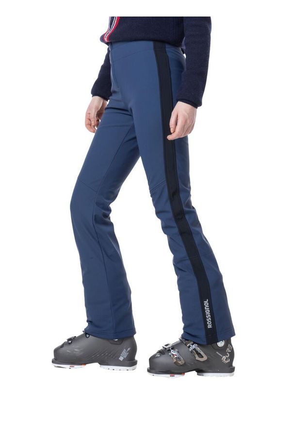 Spodnie narciarskie Rossignol damskie Resort Softshell Pant granatowe. Kolor: niebieski. Materiał: softshell. Sezon: zima. Sport: narciarstwo