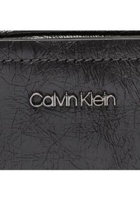 Calvin Klein Torebka Ck Connect Reporter Xs K40K400994 Czarny. Kolor: czarny. Materiał: skórzane