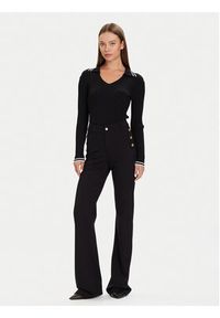 Guess Spodnie materiałowe W5BB16 KCMU2 Czarny Flare Fit. Kolor: czarny. Materiał: syntetyk