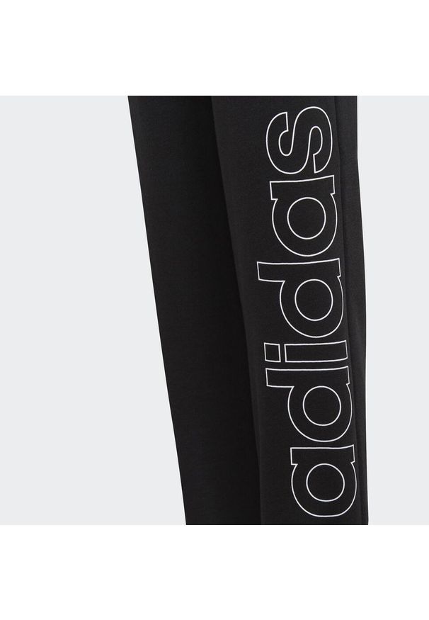 Adidas - Spodnie dziecięce adidas Essentials Logo. Kolor: czarny, biały, wielokolorowy. Sport: fitness, joga i pilates